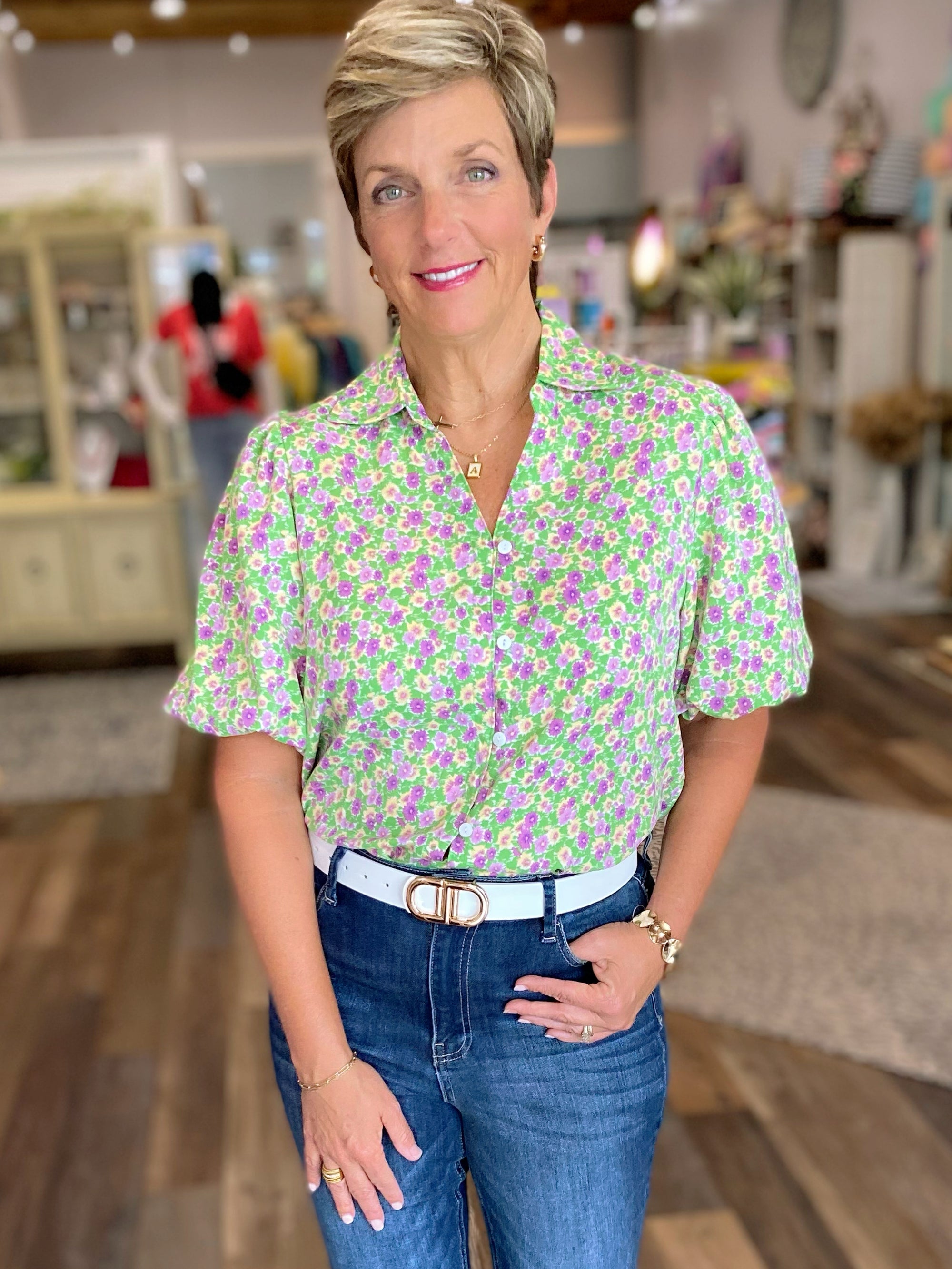 Green and lavender floral top with buttons and puff sleeves 